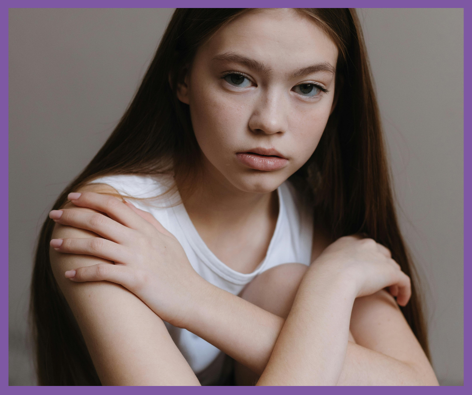 young woman looking front with a serious face